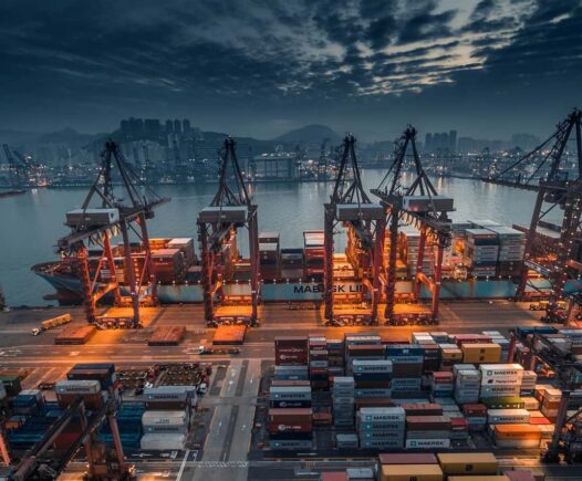 Foto von Timelab Pro red and black cargo ship on dock during daytime