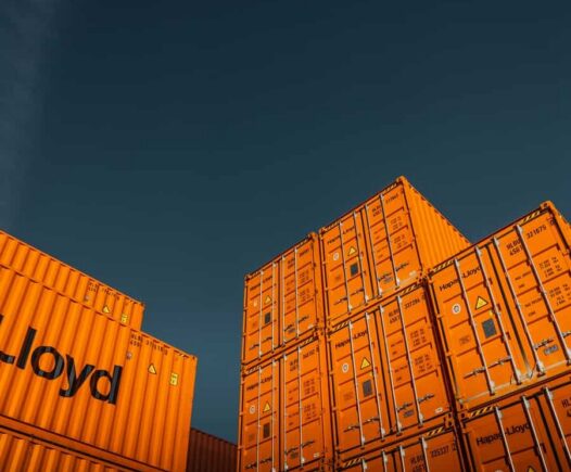 brown cardboard boxes under blue sky during daytime